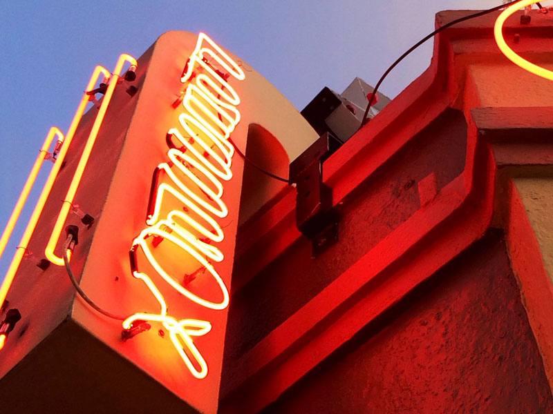 Exterior Photo of Press Box Neon Sign