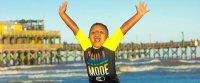 Kid Chilling on Beach by Casa del Mar