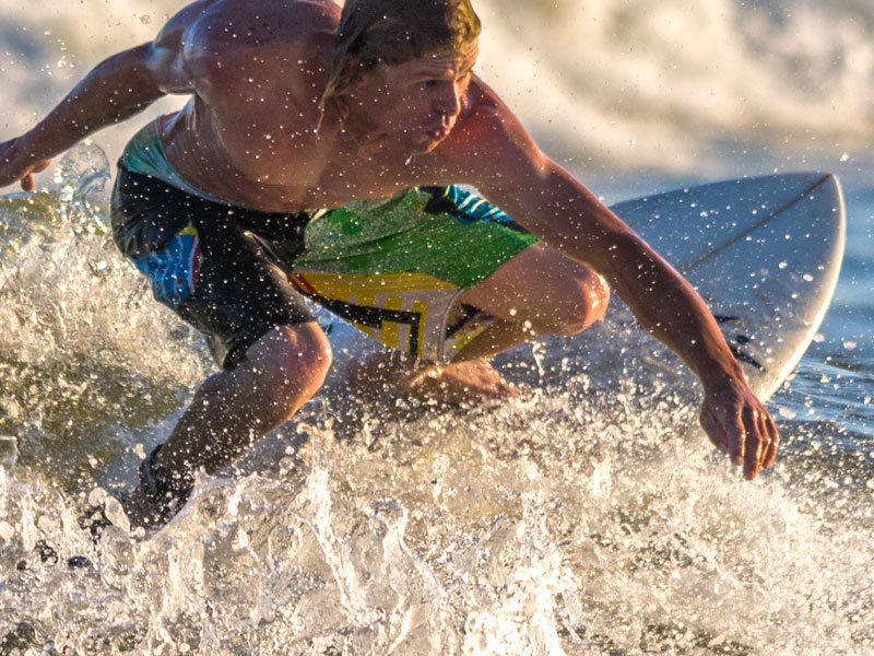 Young Male Surfing in the Gulf