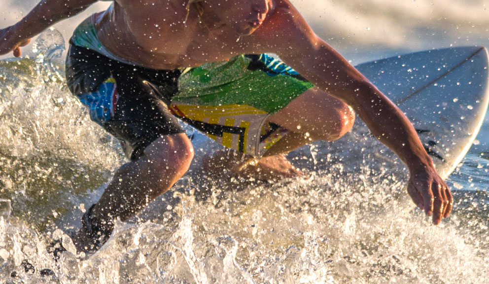 Young Male Surfing in the Gulf, Galveston TX