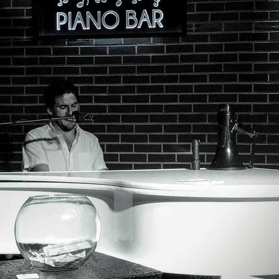 Pianist Performing at 23rd Street Station, Galveston TX