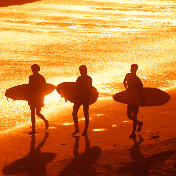 Surfers on the Beach at Sunset, Galveston, TX