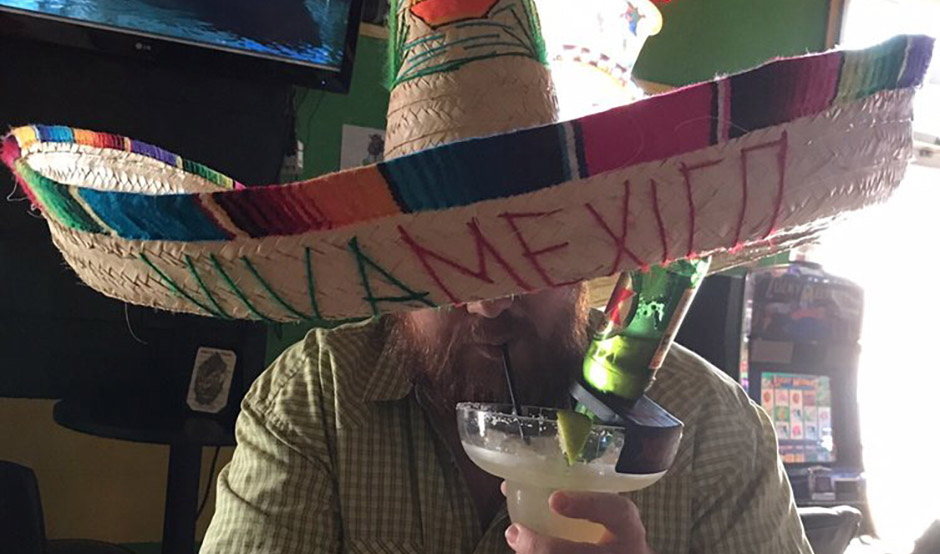 Guy Drinking Margarita at Lucky Lounge