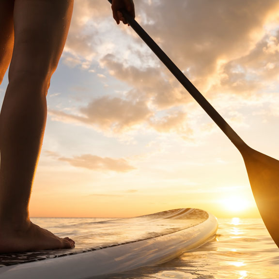 Stand Up Paddleboarder on Calm Water, Galveston TX