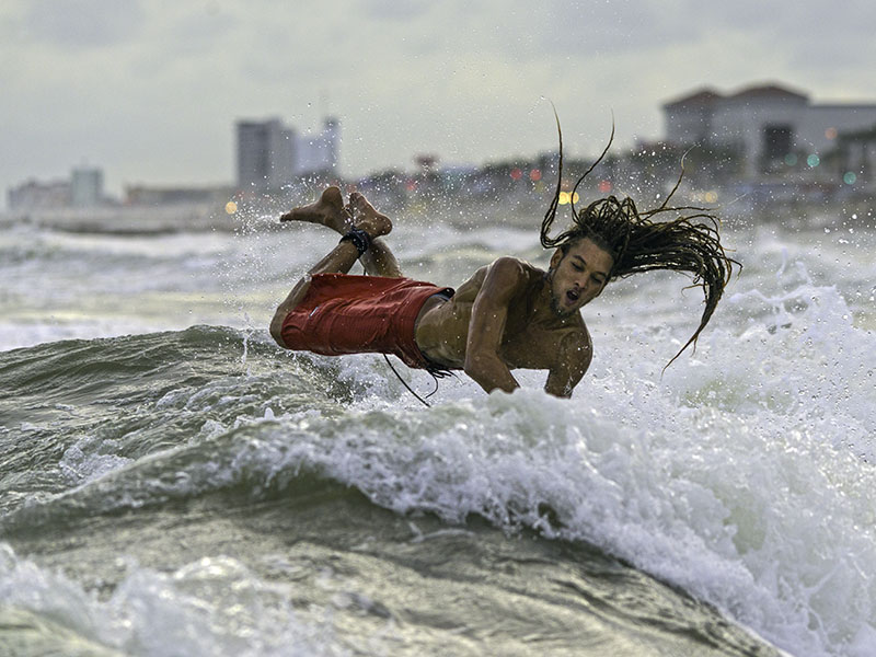 Surfer in Waves