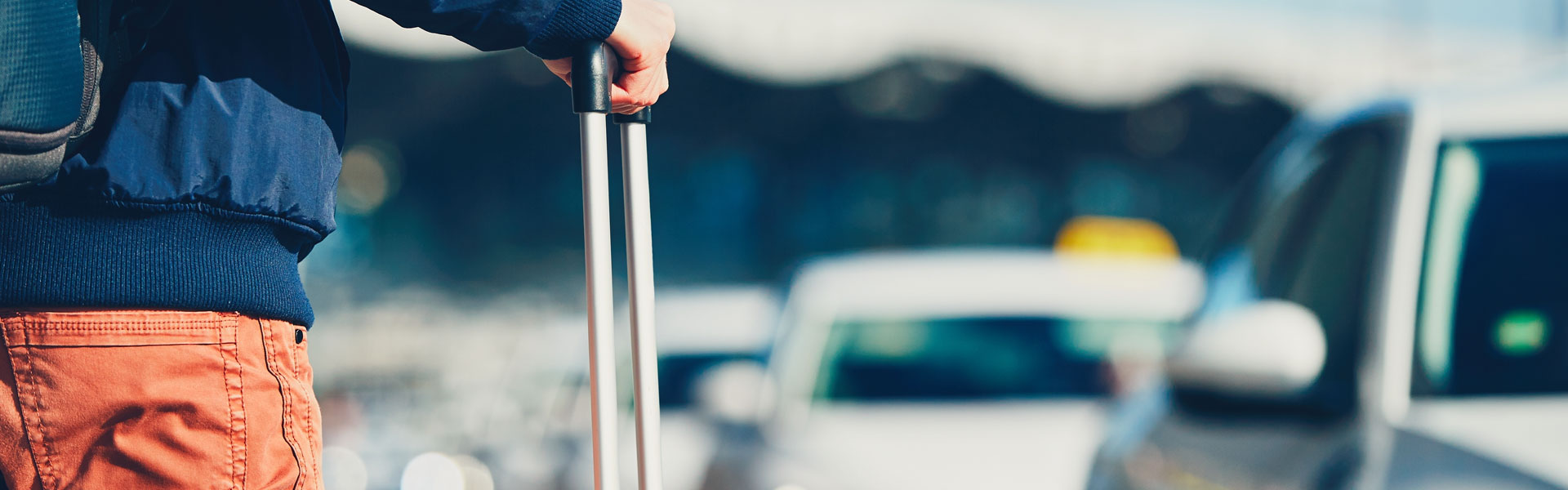 Passenger Waiting for Transportation from Airport