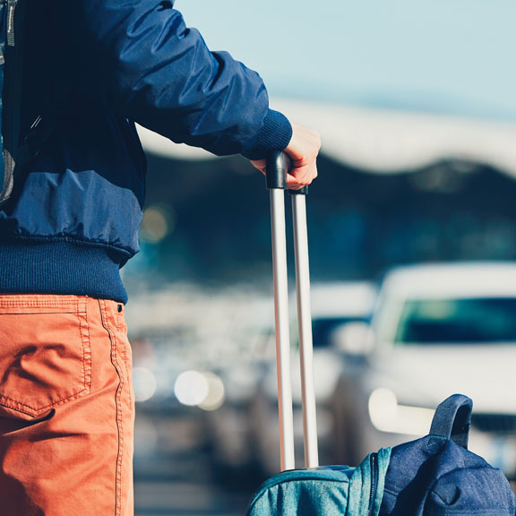 Passenger Waiting for Transportation from Airport