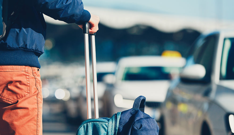 Passenger Waiting for Transportation from Airport