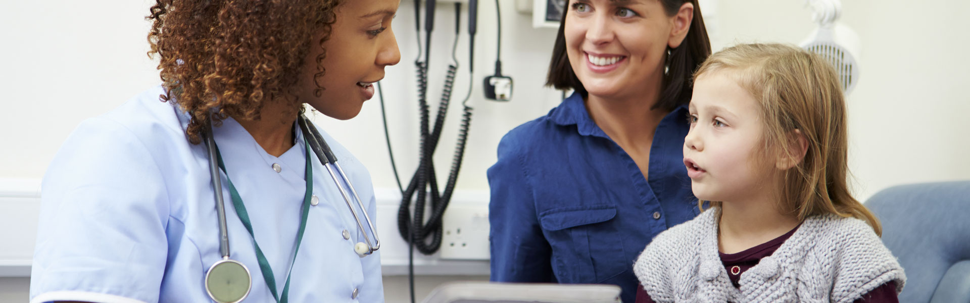 Nurse with Mother & Young Patient