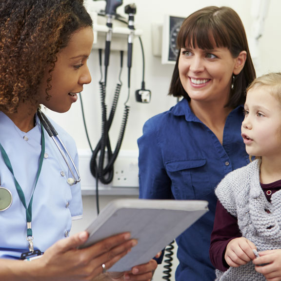 Nurse with Mother & Young Patient