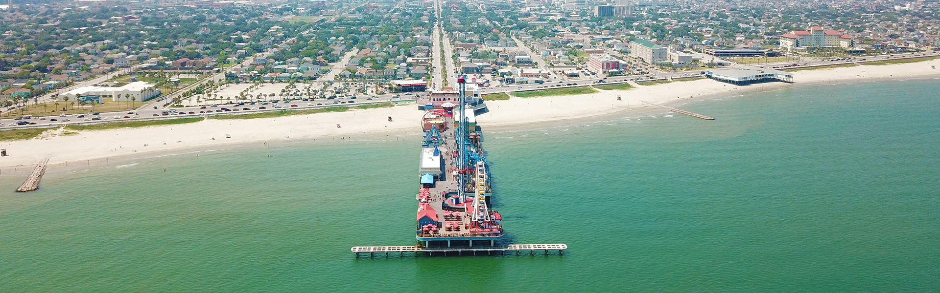 Aerial View of Seawall and Pleasure Pier Texas Seaport Museum