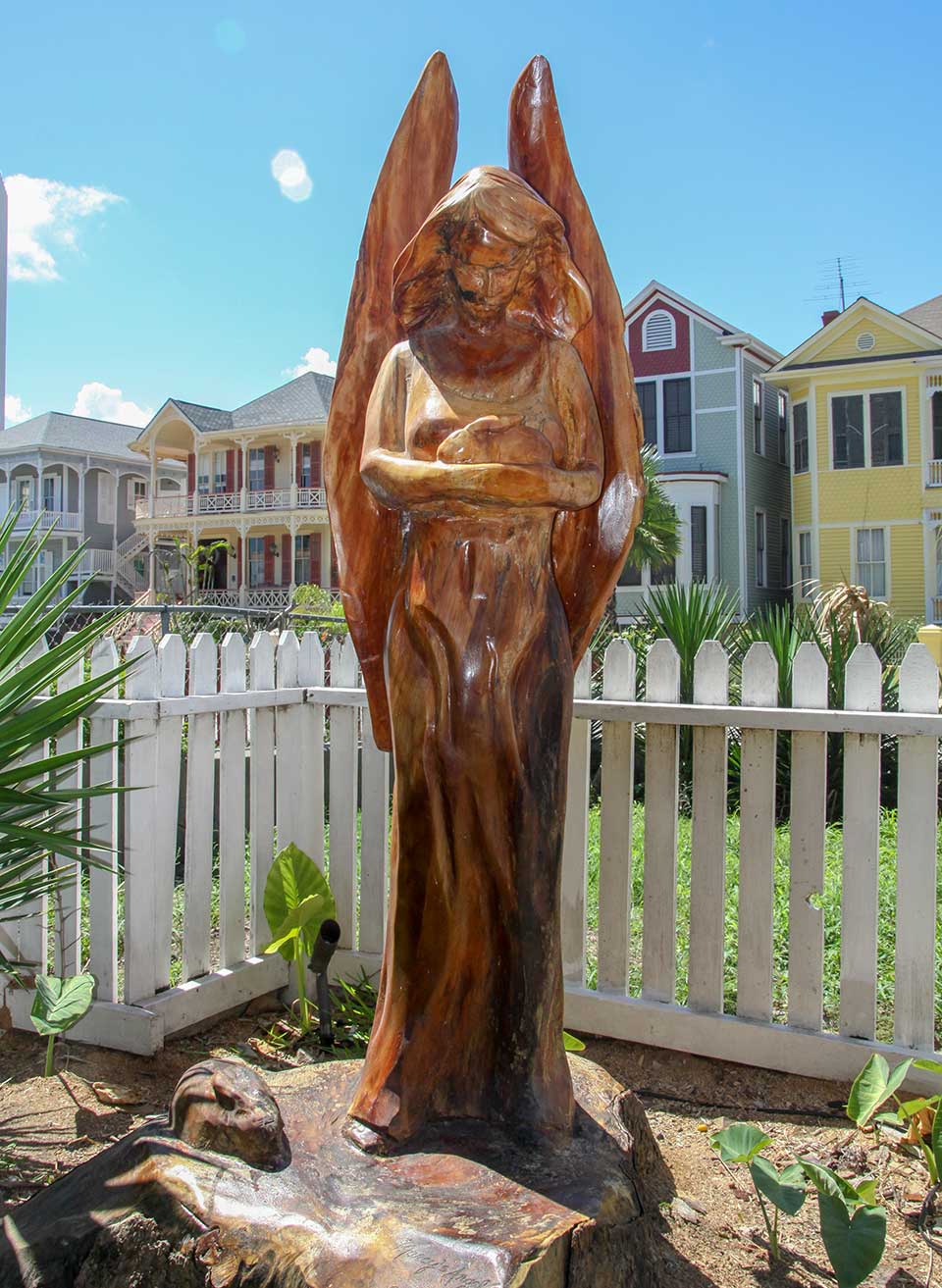 Angel Cradling Bunny Tree Sculpture