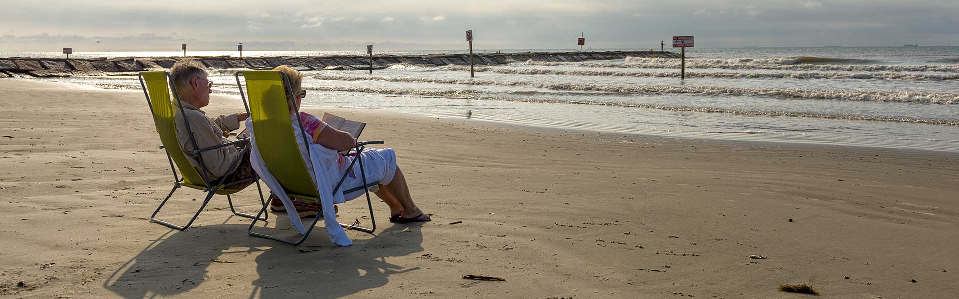 Couple Beach Chairs Couple at Beach, Galveston, TX