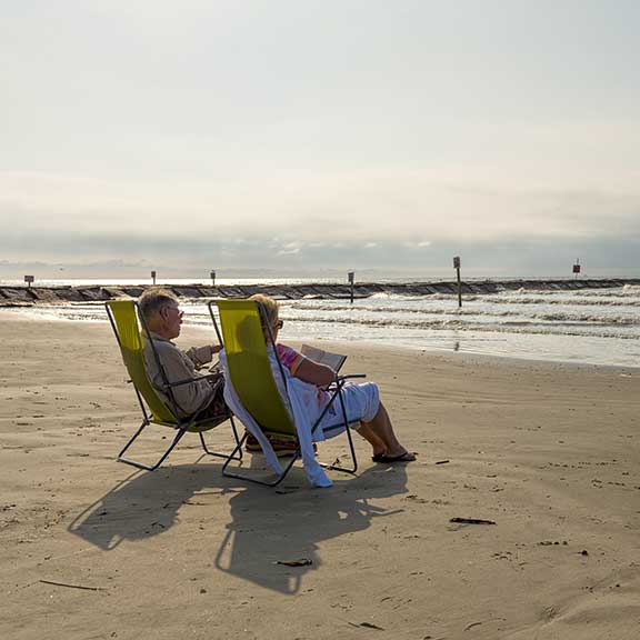 Couple Beach Chairs Couple at Beach, Galveston, TX
