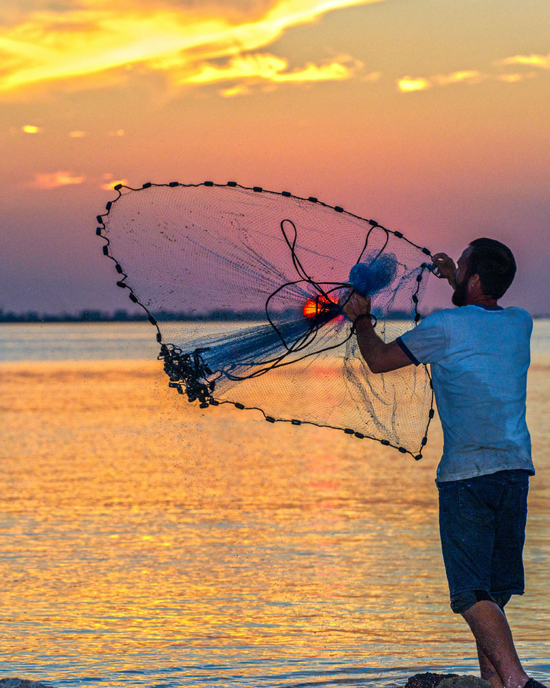 Casting a Fishing Net, Galveston, .TX