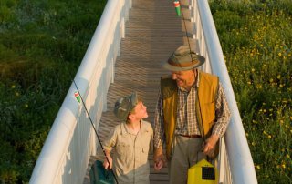 Grandfather Fishing with Grandson