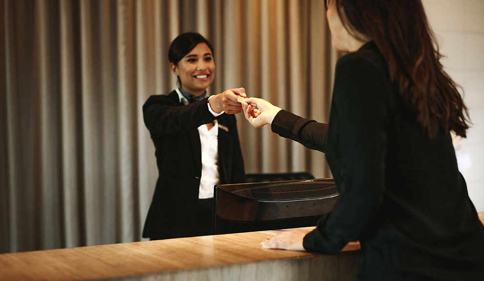 Guest Checking into Hotel Fisherman's Wharf, Galveston TX