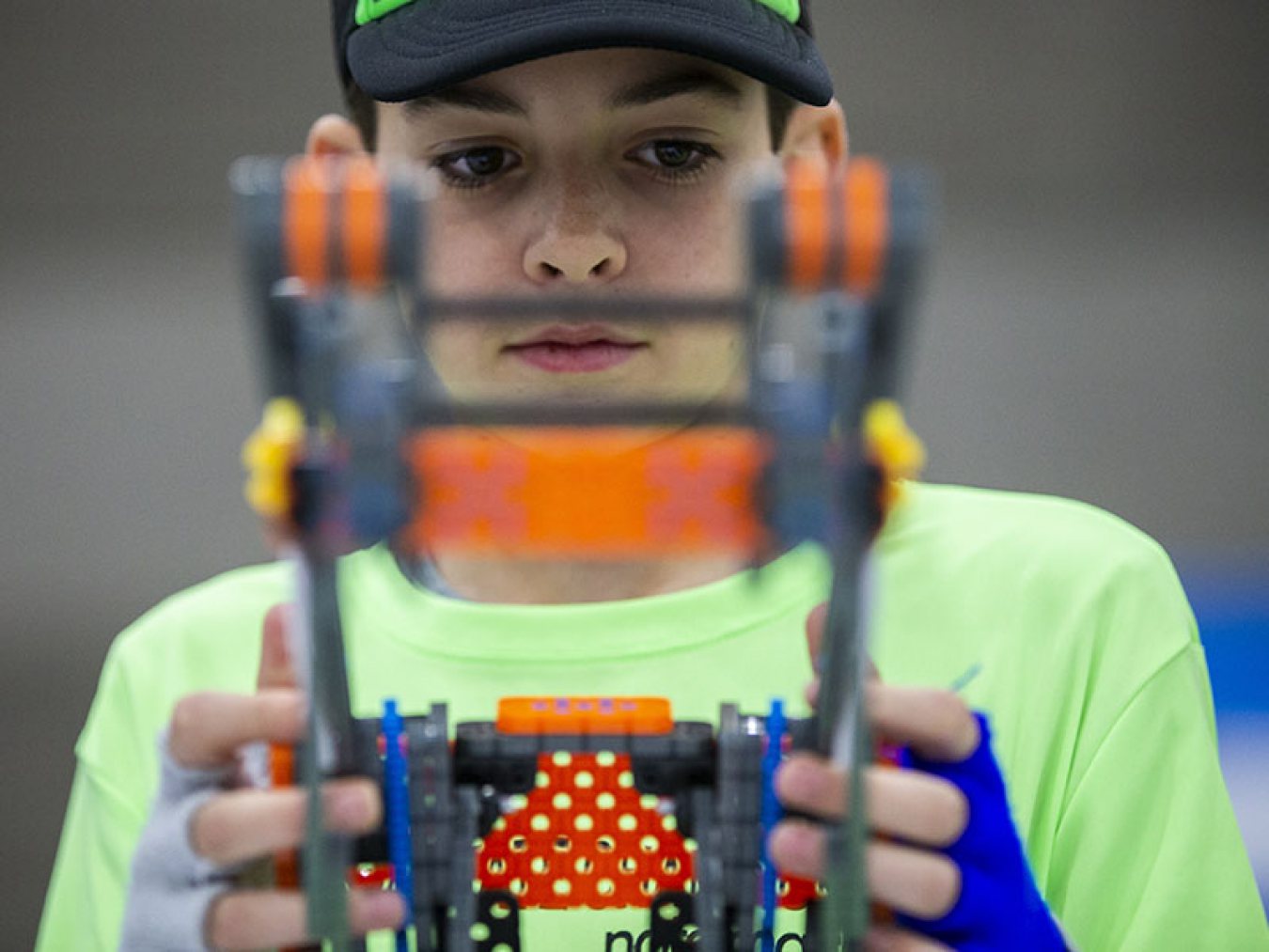 Boy Holding Robot