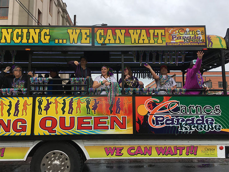 Dancing Queen Float with People Throwing Beads