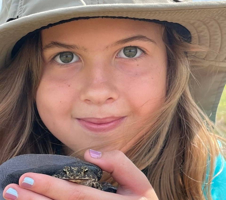 Girl with Turtle at Coastal Heritage Preserve