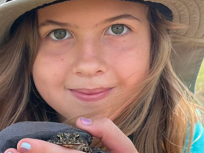 Girl with Turtle at Coastal Heritage Preserve