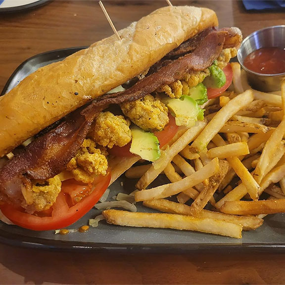 Shucks Oyster Bar Poboy and Fries