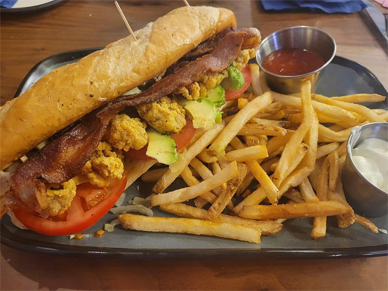 Shucks Oyster Bar Poboy and Fries